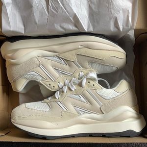 New Balance 57/40 Women’s size 7 Sea Salt/Taupe. Never worn, in original box.